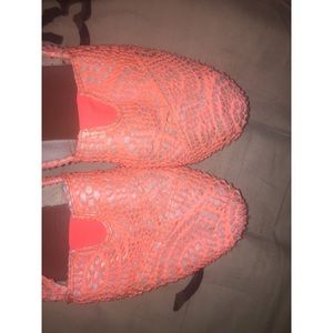 Orange slip on shoes